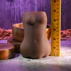 Skyler Nicole Stroker standing upright beside ruler, showing approximately 5-inch height