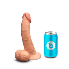 Slipskin 8 Inch Curvy Mocha dildo standing beside standard beverage can for size reference