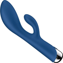 Close-up of smooth blue silicone rabbit vibrator body and curved clitoral arm at rest