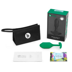 Snug Plug 2 shown with storage pouch, user guide, and anal play booklet included