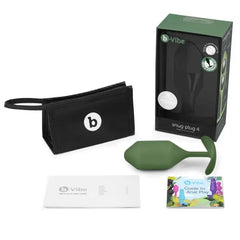 Snug Plug 4 shown with box, storage pouch, user guide, and anal play booklet included
