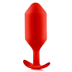 Snug Plug 6 red silicone plug side profile highlighting smooth matte finish and slim neck
