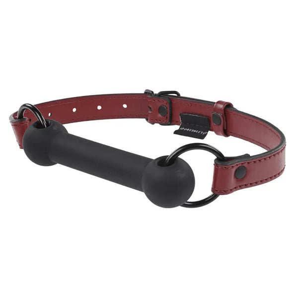 Sportsheets Saffron Silicone Bit Gag with red vegan leather strap and black O-rings