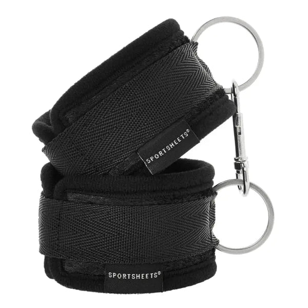 Sportsheets Soft Wrist Cuffs in black neoprene with silver D-rings, stacked pair