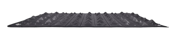 Sportsheets Edge Spiked Punishment Mat shown flat, side profile, black rubber with pyramid texture