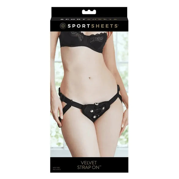 Sportsheets Velvet Strap-On harness in black, shown on model, front view in retail box