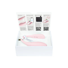 Spot vibrator displayed in open white box with illustrated quick-start guide insert
