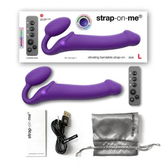 Strap-On-Me size L unboxed with remote, USB cable, storage pouch, and manual