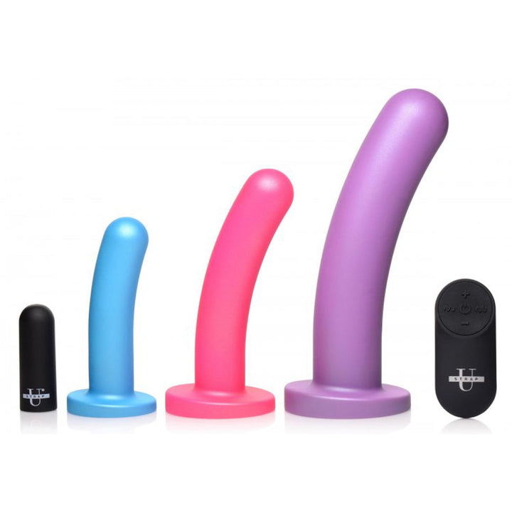 Strap U Triple Peg vibrating dildo set in blue, pink, and purple silicone with remote and bullet