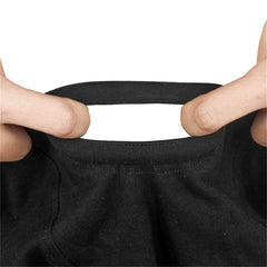 Close-up of stretchy black fabric being pulled to demonstrate elastic flexibility and soft textile quality