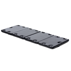 STRICT XL Bondage Board unfolded flat showing four quilted padded segments with evenly spaced D-rings