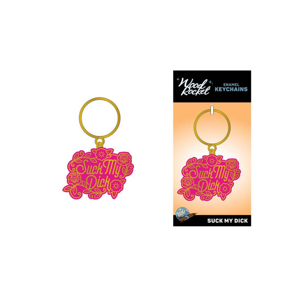 Suck My Dick keychain by Wood Rocket shown beside its branded retail card packaging