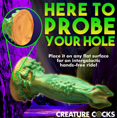Suction cup close-up of alien silicone dildo for hands-free flat-surface mounting use