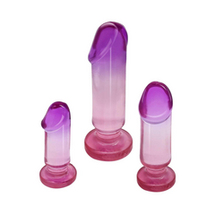 Sunset Dreams Anal Training Kit trio displayed at an angle showing realistic tapered tips and pink bases
