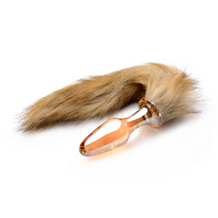 Tailz orange glass anal plug with attached natural brown fox tail, side view