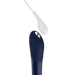 Close-up of Tango X magnetic USB charging port with cable hovering above the connector
