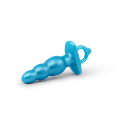 Teal blue beaded silicone anal plug lying on its side showing tapered bead shape