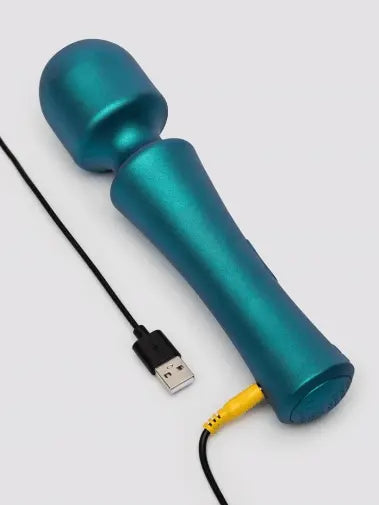 Teal ROMP Presto Wand lying flat beside USB charging cable with yellow connector