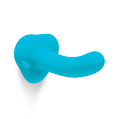 Teal silicone curved dildo displayed horizontally, showing suction-cup base and smooth texture