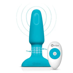 Teal silicone rimming plug showing rotating bead ring and wireless remote control