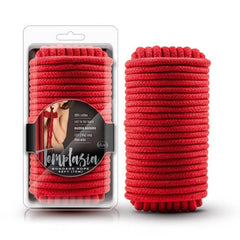 Temptasia red cotton bondage rope coiled beside retail packaging, 32ft length