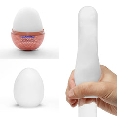 Tenga Egg shown closed, open base, and stretched over a smooth cylinder demonstrating elastomer stretch