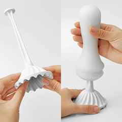Tenga Flex internal sleeve fully extended on stem beside assembled unit on base stand