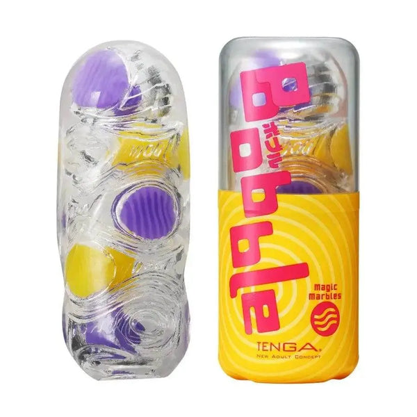 Tenga Bobble Magic Marbles Stroker beside its yellow spiral-print canister packaging
