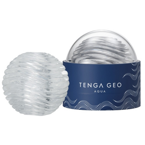 Tenga Geo Aqua masturbator beside its navy blue dome-shaped case, clear spiral-textured silicone ball