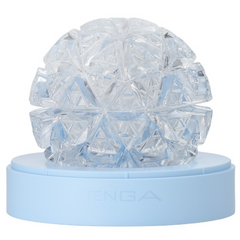Close-up of Tenga Geo Glacier on pale blue base showing intricate triangular faceted surface detail