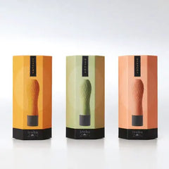 Tenga Iroha Zen vibrators in yuzu, matcha, and sakura colorways displayed in matching cylindrical boxes
