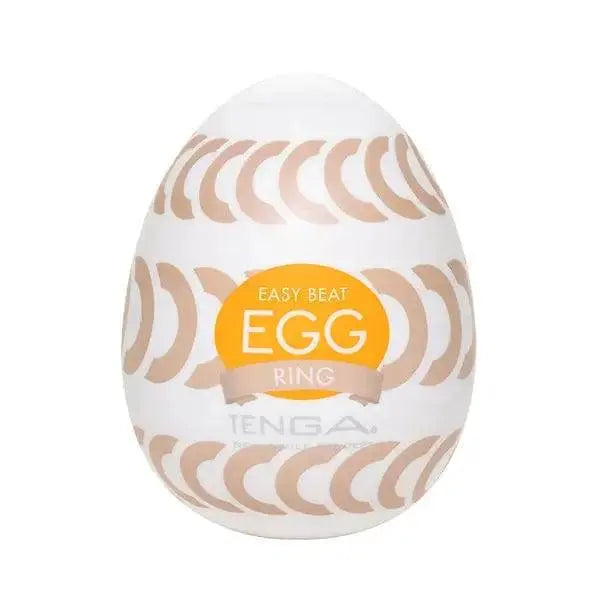 Tenga Egg Ring masturbator in white egg-shaped shell with curved ring pattern and orange label