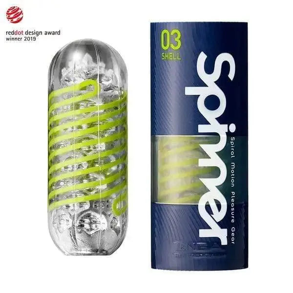 Tenga Spinner Shell 03 masturbator with lime spiral band beside its navy blue tube packaging