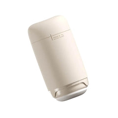 Tenga Puffy Latte Brown lying at angle, showing locked base closure detail