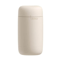 Tenga Puffy Latte Brown male masturbator, discreet capsule design, rear three-quarter view