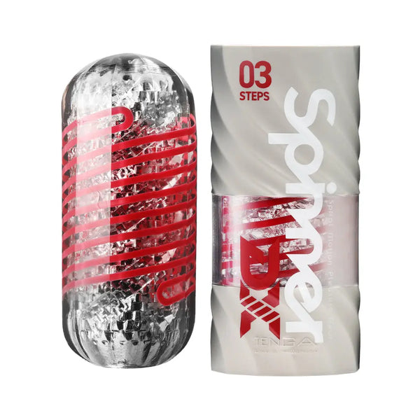 Tenga Spinner DX 03 Steps male masturbator with clear textured sleeve beside silver packaging