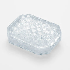 Tenga Uni Diamond clear gel massager with raised pyramid-cut texture, angled top view
