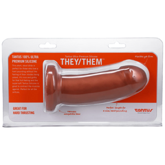 They/Them dildo in retail clamshell packaging highlighting ultra-premium silicone and harness-compatible base