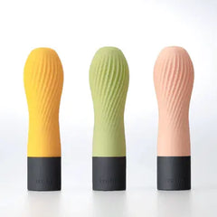 Three Iroha Zen massagers side by side in yuzu yellow, matcha green, and sakura pink colorways