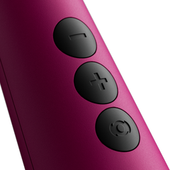 Close-up of three matte black buttons on Doxy wand: minus, plus, and power controls