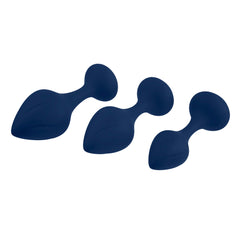 Three navy silicone anal plugs lying flat, side profile highlighting tapered tip and base shape