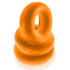 Three orange Fat Willy jumbo cock rings shown at a side angle, soft flexible build