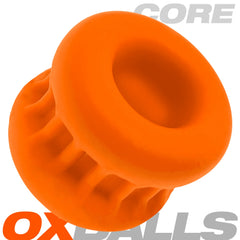 Three-quarter angle of orange Core Ballstretcher highlighting flexible curved form
