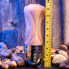 Tight Lipped masturbator beside ruler showing approximately 9-inch total height