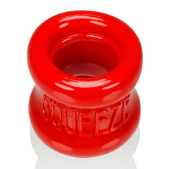 Close-up top angle of red Oxballs Squeeze stretcher highlighting dual inner raised rings