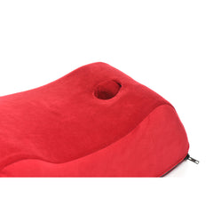 Close-up top detail of circular wand-insertion hole in red velvet Deluxe Wand Saddle cover