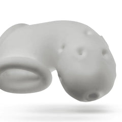 Close-up top-down angle of Airlock chastity cage emphasising raised dot texture and soft silicone finish