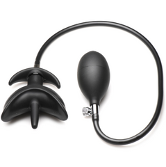 Top-down view of black silicone anchor anal plug fully inflated beside connected squeeze pump bulb