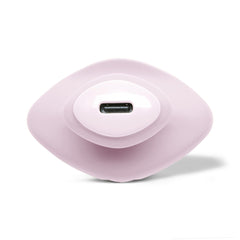 Top-down view of Fin 2.0 USB-C charging port recessed into smooth pink silicone body