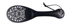 Top-down view of Lace Spanker highlighting cut-out lace design and stitched leather handle